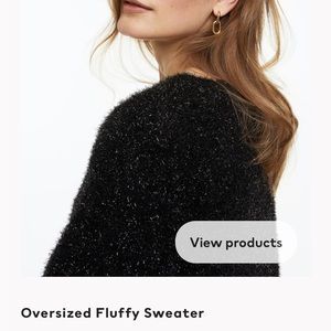 Black glitter oversized eyelash sweater